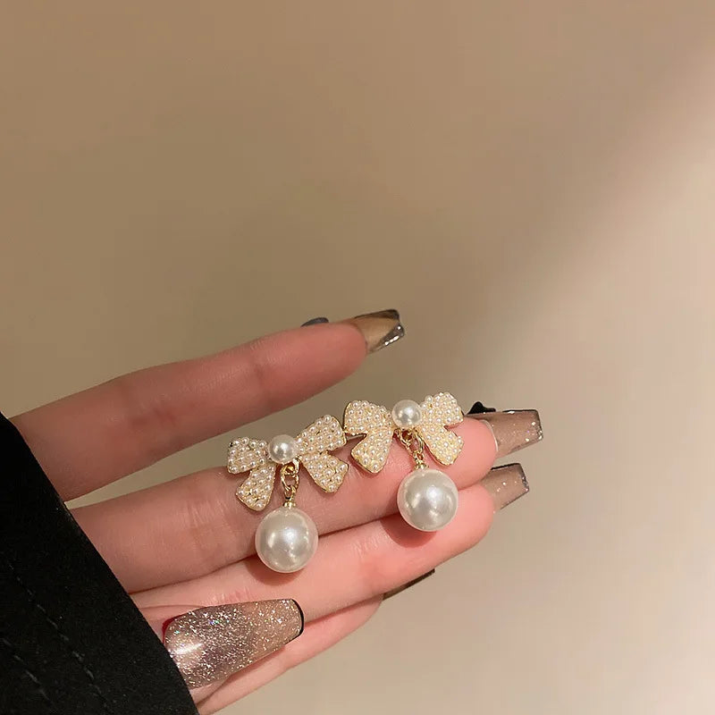 “Long Pearl Rhinestone Drop Earrings”