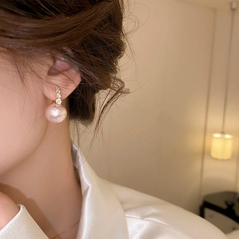 “Elegant Pink Pearl Dangle Earrings”