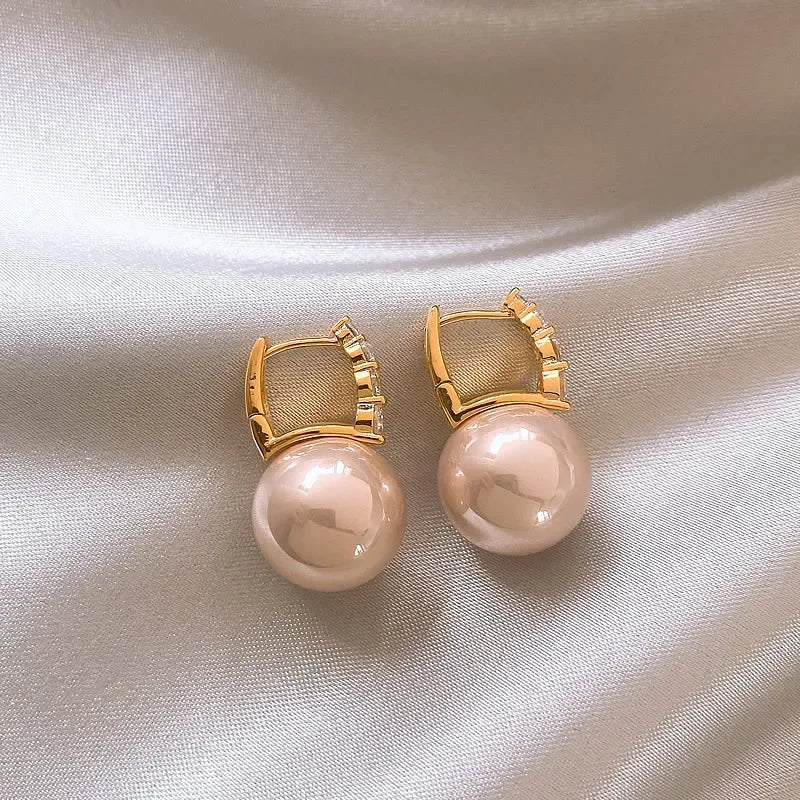 “Elegant Pink Pearl Dangle Earrings”