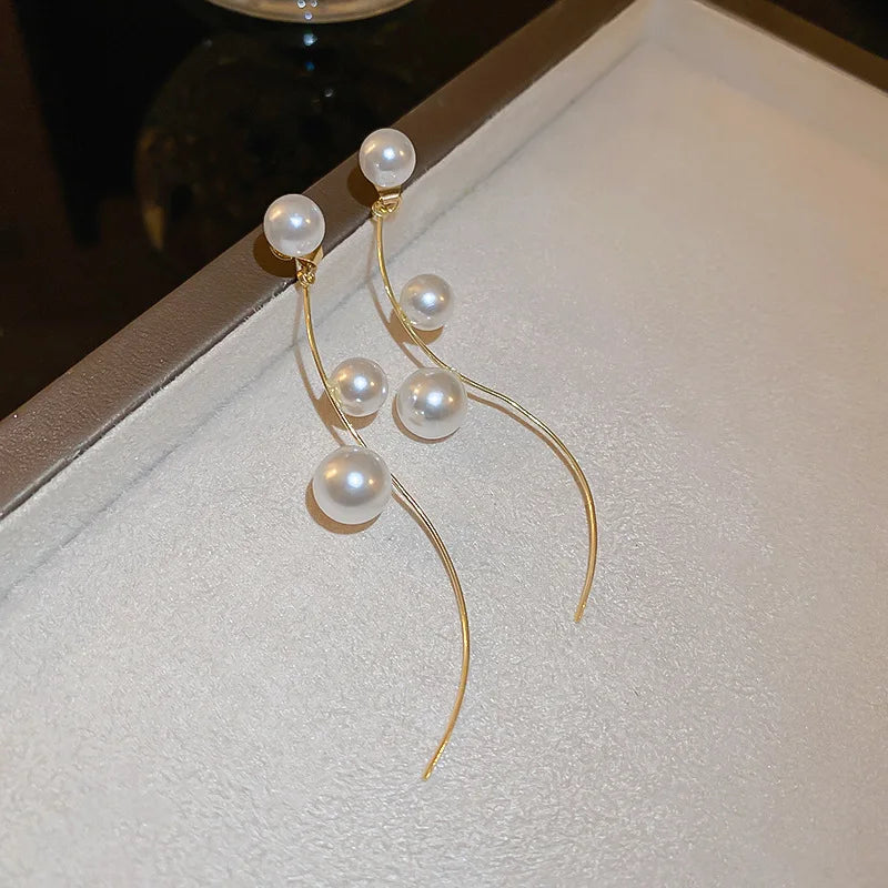 “Long Pearl Rhinestone Drop Earrings”
