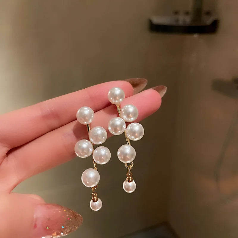 “Long Pearl Rhinestone Drop Earrings”