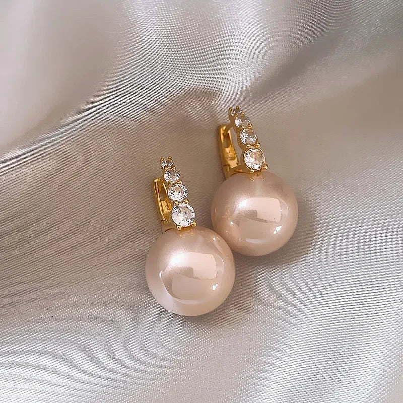 “Elegant Pink Pearl Dangle Earrings”