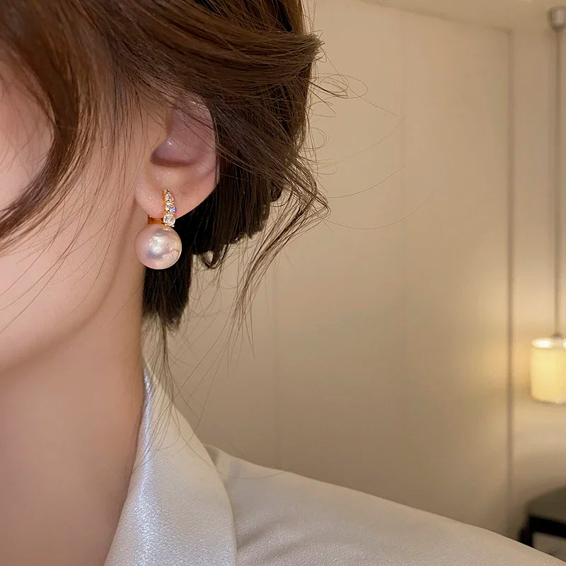 “Elegant Pink Pearl Dangle Earrings”