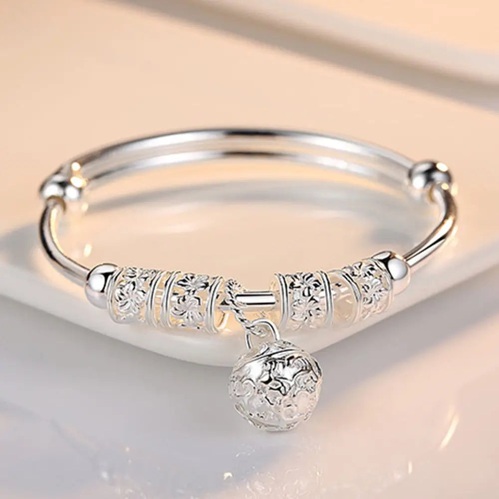 “Silver Hollow Bell Adjustable Bangle Bracelet”