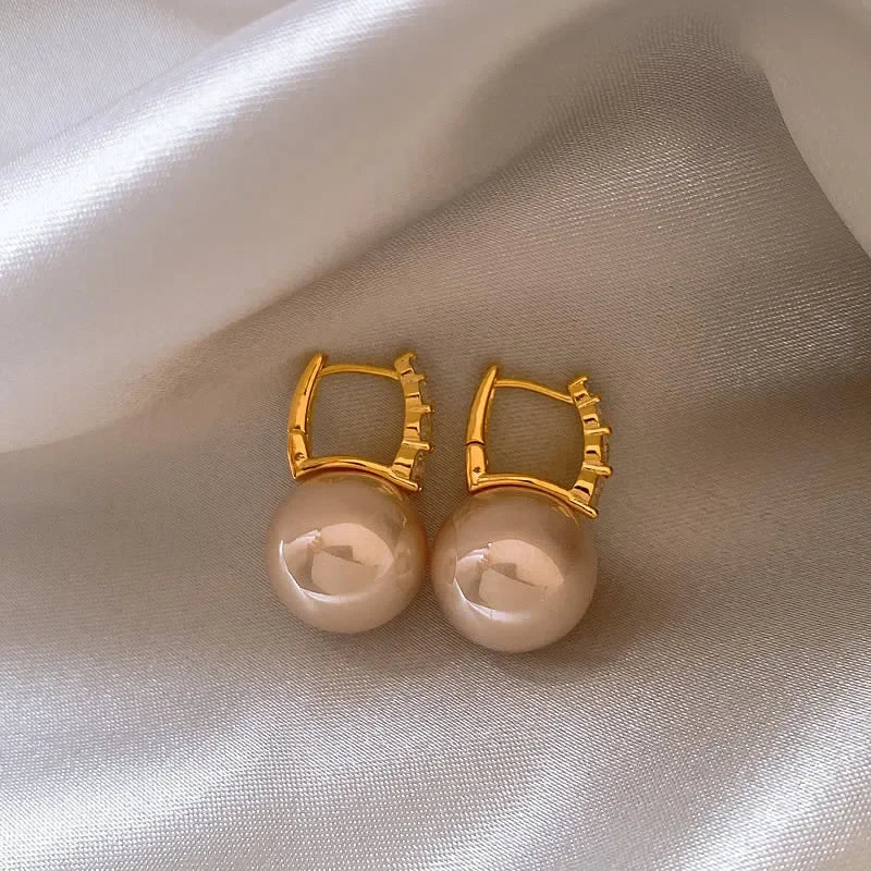 “Elegant Pink Pearl Dangle Earrings”