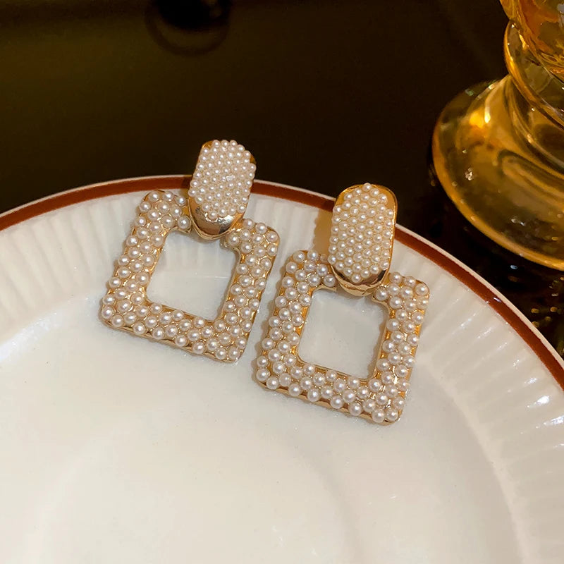 “Long Pearl Rhinestone Drop Earrings”