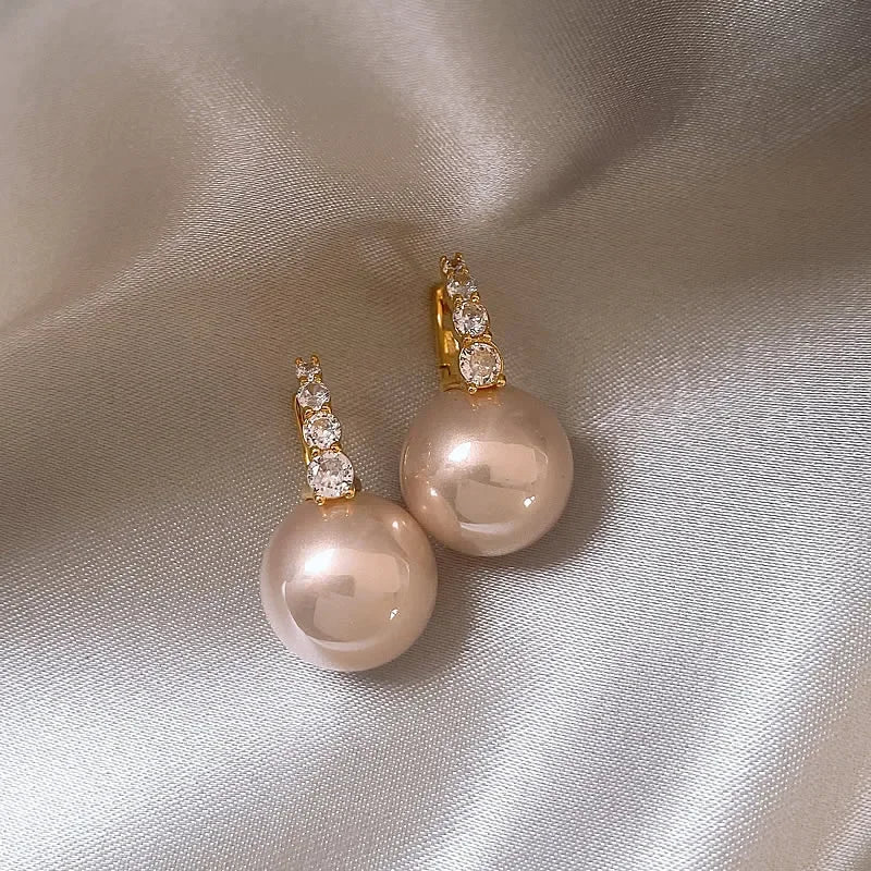 “Elegant Pink Pearl Dangle Earrings”