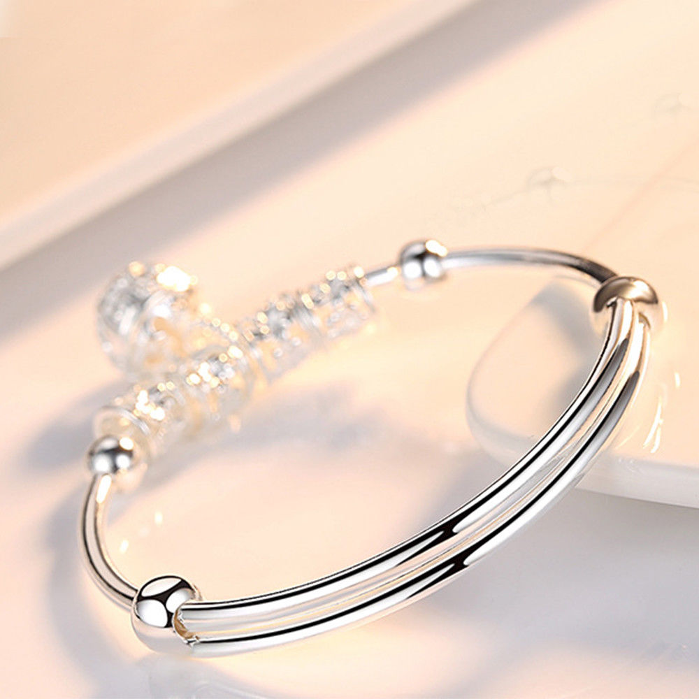 “Silver Hollow Bell Adjustable Bangle Bracelet”