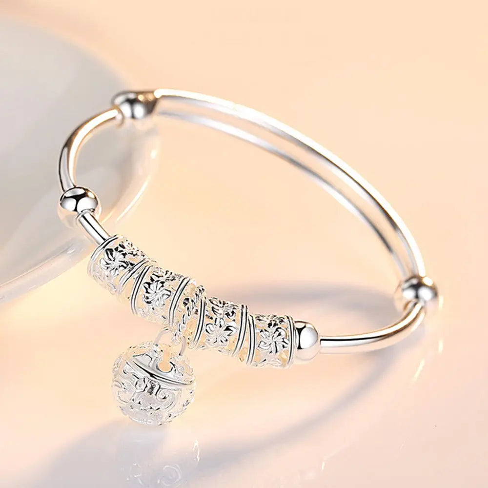 “Silver Hollow Bell Adjustable Bangle Bracelet”