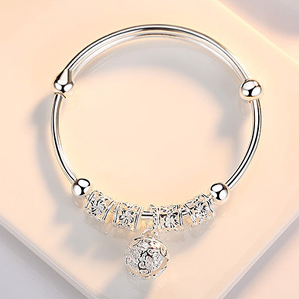 “Silver Hollow Bell Adjustable Bangle Bracelet”