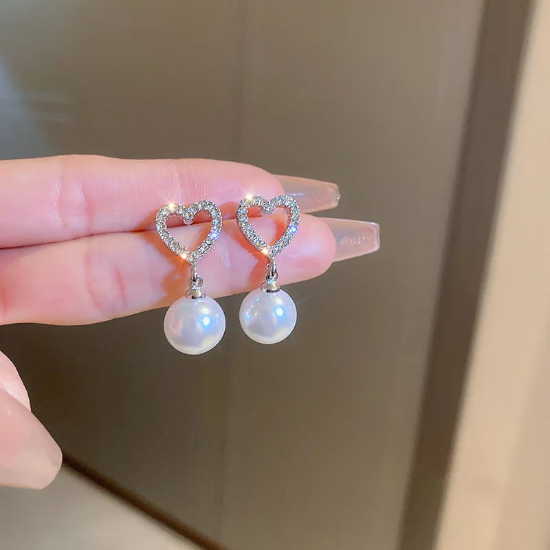 “Long Pearl Rhinestone Drop Earrings”