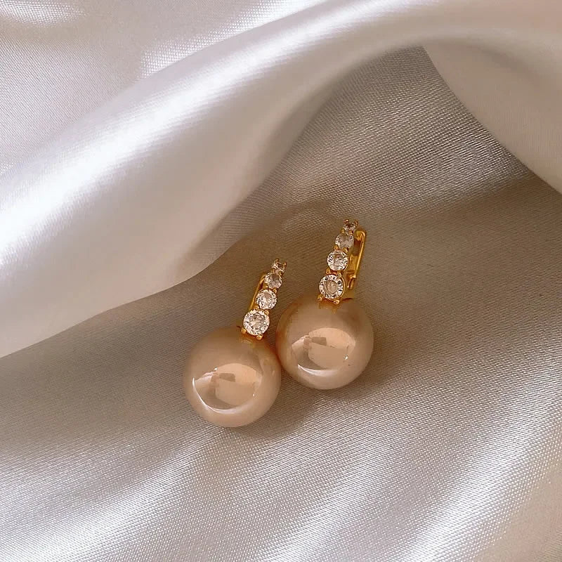 “Elegant Pink Pearl Dangle Earrings”