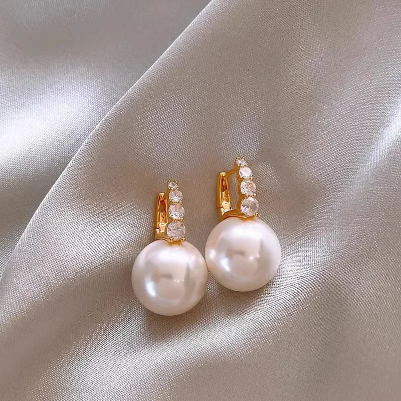 “Elegant Pink Pearl Dangle Earrings”